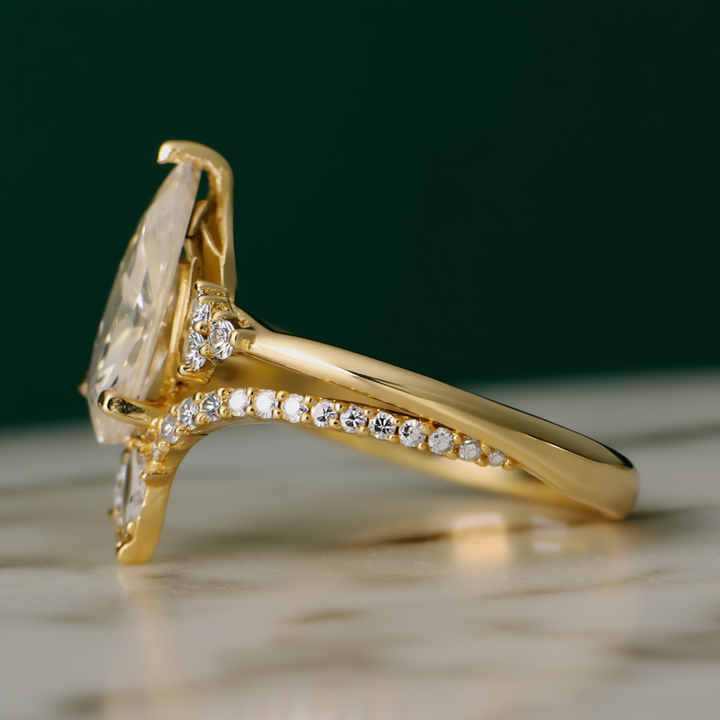 Pear solitaire ring side view